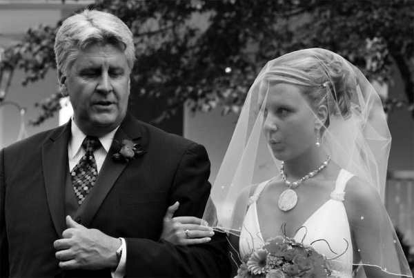 The bride looks ahead.