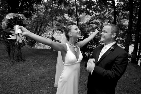 The bride celebrates with her husband.