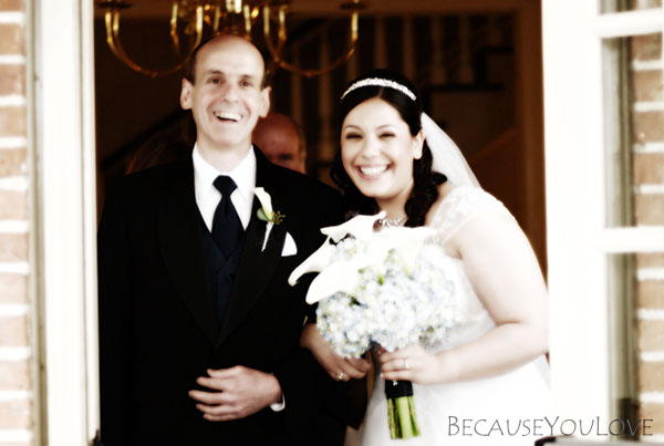 Bride and father prepare to walk the aisle