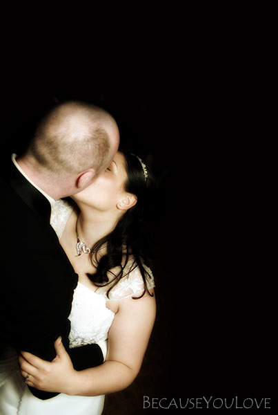 The bride and groom dance