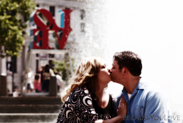 A photo-journalistic the engaged couple in love park in Philadelphia Pennsylvania