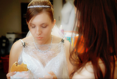 Photo of Bride in a Private Moment with Her Friends by Wedding Photographer