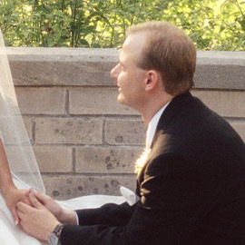 Another close up of the same photograph of groom proposing to bride