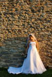 Formal portrait of the bride after her wedding ceremony.