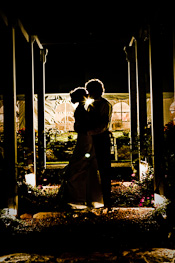 wedding photographer captures the vivid deep colors of this bride and groom kissing during a wedding in pennsylvania