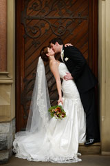 romantic photograph of the bride and groom kissing