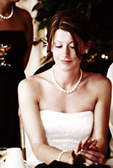 this wedding photograph of the bride admiring her ring has been artistically enhanced