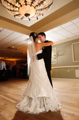 bride and groom have their first dance together