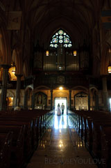 journalistic photograph of bride and groom leave after the wedding ceremony