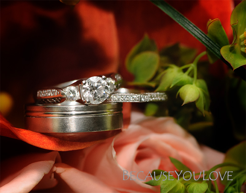 close up photograph of wedding ring and flower details